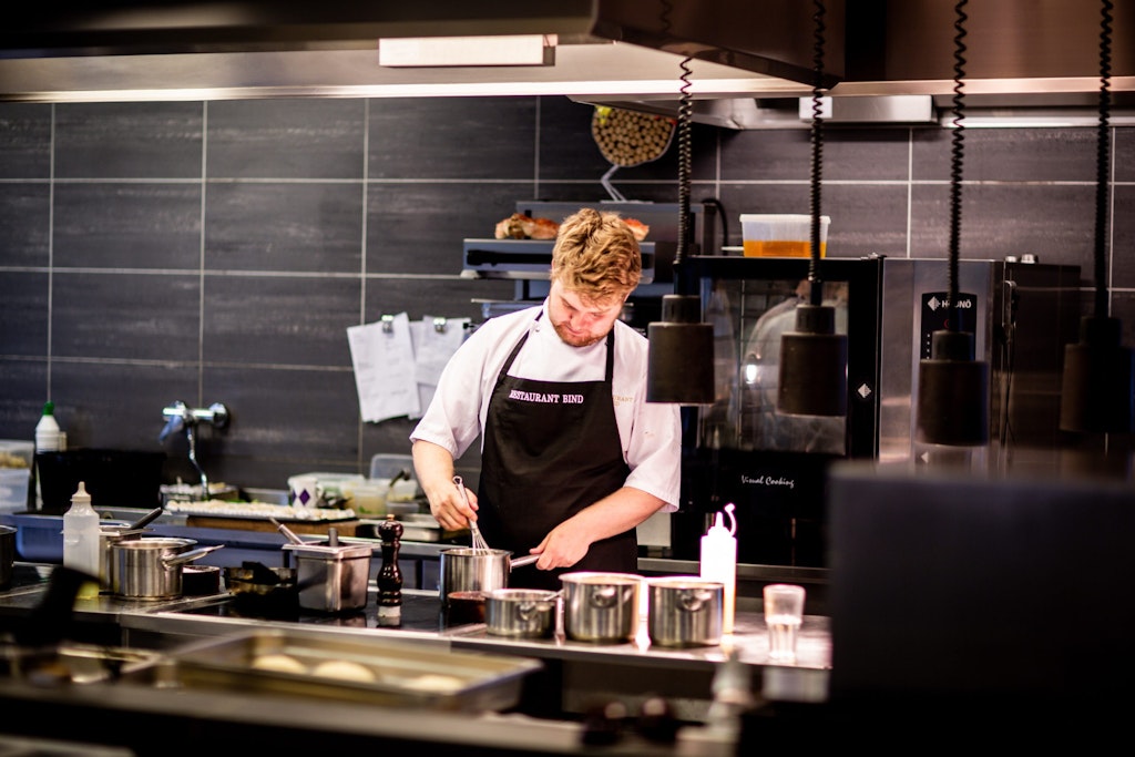 chef cooking in a restaurant kitchen